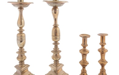 A pair of brass candlesticks in Spanish 17th century style, ...