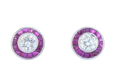 A pair of brilliant-cut diamond and ruby cluster earrings.