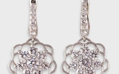 A pair of diamond and platinum drop earrings