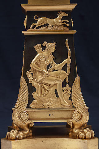 A pair of fine and impressive Empire 'Retour D'Egypt' gilt and patinated bronze seven light figural candelabra