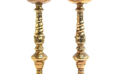 A pair of late 18th/early 19th century European brass candle...