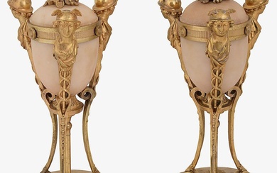 A pair of late 19th century French gilt bronze and alabaster cassolettes