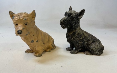 A pair of painted Black & White spelter dogs, length...