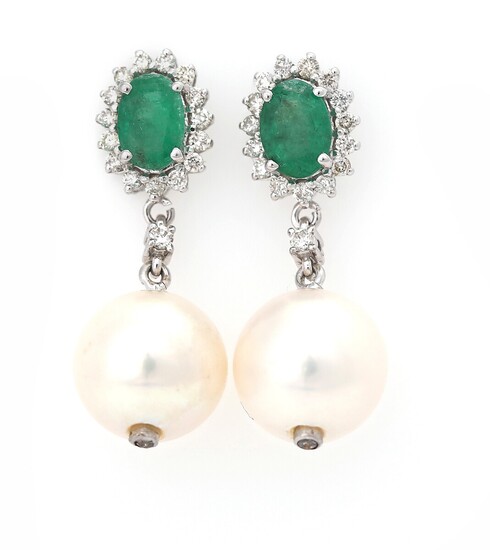 NOT SOLD. A pair of pearl, diamond and emerald ear pendants each set with a...