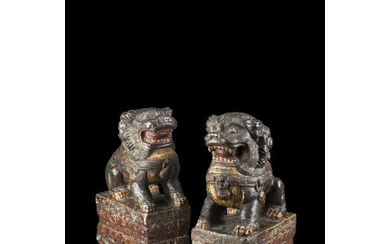 A pair painted stone Pho dogs China, 19th century (h. 20 cm.)