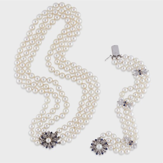 A pearl, sapphire, and fourteen karat white gold necklace and bracelet suite