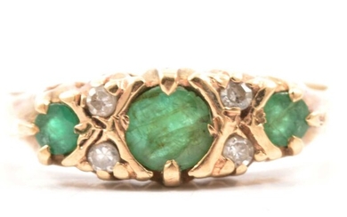 A reproduction Victorian style emerald and diamond half hoop ring.
