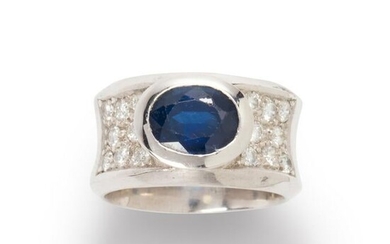 A sapphire, diamond and eighteen karat white gold ring