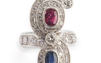 A sapphire, ruby and diamond ring set with a sapphire,...