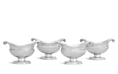 A set of four George III silver sauce tureens from...