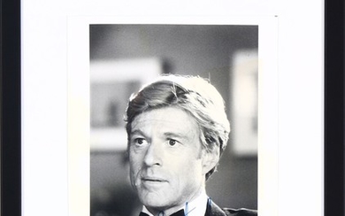 A signed black-and-white photograph of the American actor Robert Redford (b. 1936).