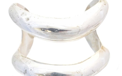 A silver cuff bangle by Elsa Peretti for Tiffany & Co.