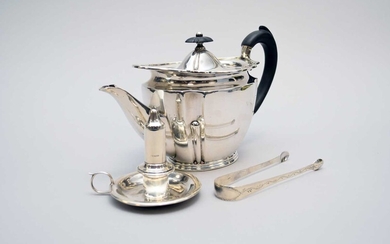 A silver teapot, pair of sugar tongs and taperstick