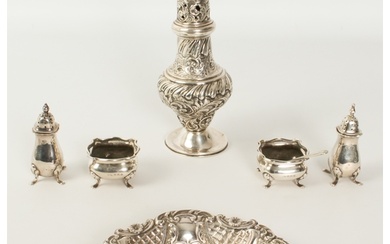 A small group of silver items comprising: a pair of salts b...