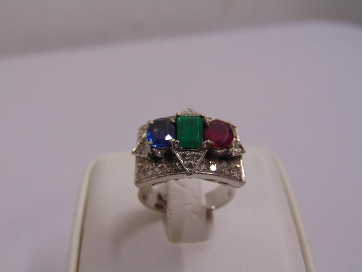 A white gold, sapphire, emerald, ruby and diamond Art Deco s...