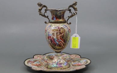 ANTIQUE VIENNESE ENAMEL ON GOLD GILT SILVER, URN SHAPED SPILL VASE WITH FIGUREHEAD HANDLES, CAMEOS OF CLASSICAL SCENES TO BODY, CLASSICAL SCENES AROUND FOOT AND NECK AS WELL AS INSIDE THROAT, ON SCALPED SHAPED SAUCER