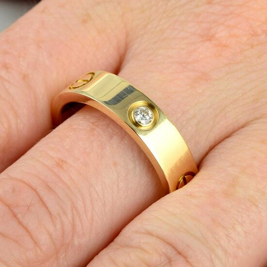 An 18ct gold diamond 'Love' ring, by Cartier.Estimated