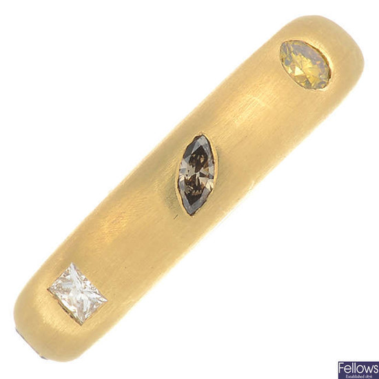 An 18ct gold vari-shape 'brown', 'yellow' diamond and diamond band ring.