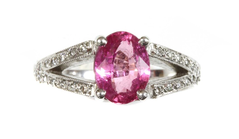 An 18ct white gold single stone pink sapphire ring