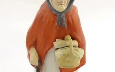 An 18th / 19thC Staffordshire figure modelled as an old
