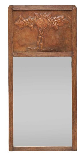 An Arts and Crafts oak wall mirror
