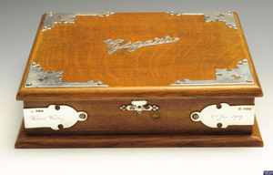 An Edwardian silver mounted table cigar box.
