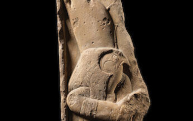 An Egyptian limestone relief fragment of Horus