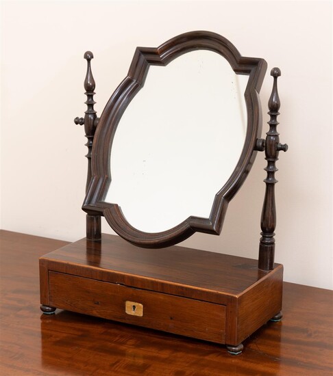 An antique rosewood dressing table swing mirror with shaped top...