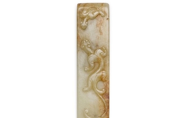 An archaistic celadon and russet jade scabbard slide, Song - Ming dynasty | 宋至明 褐斑青玉仿古劍璏