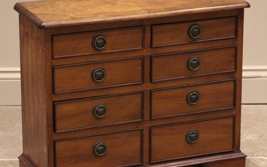 An early 20th century and later constructed figured walnut c...