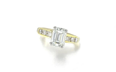An emerald-cut diamond ring
