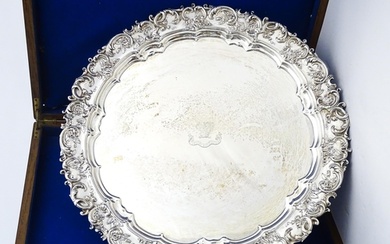 An exceptionally large silver salver with acanthus scroll fl...