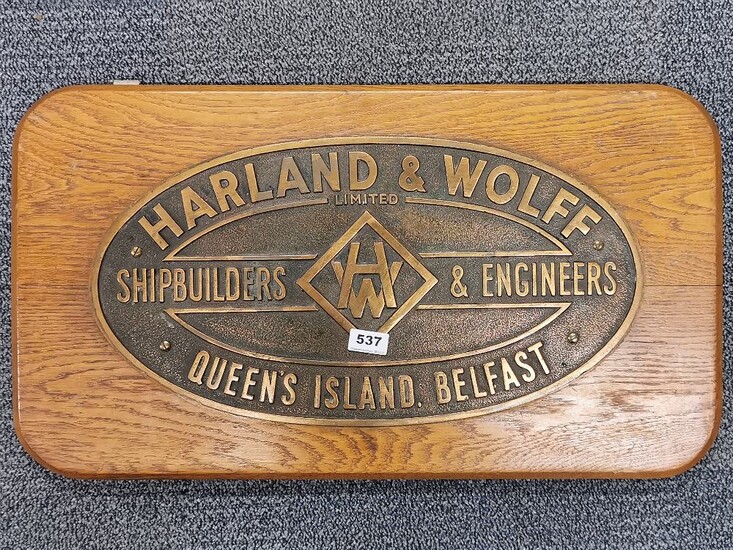 An oak mounted bronze Harland & Wolff shipyard plaque, 70 x 39cm.