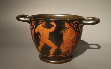 Ancient Greek Ceramic Attic, 5th Century BC Red figure Skyphos with a satyr and menad. 23,5 cm L. With TL test.