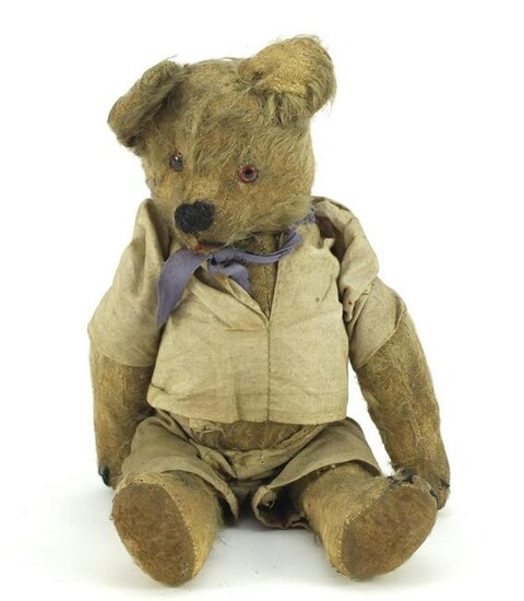 Antique golden straw filled teddy bear with jointed