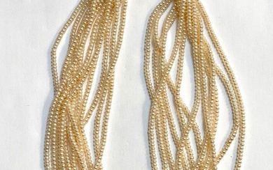 COLLIER torsadé de perles d'eau douce, fermoir or poids 97 g long 46 cm