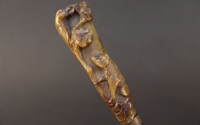 Cane with gnarled wooden shaft. Horn knob carved with the fable of the crow and the fox. Height 93 cm