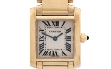 Cartier. A lady's 18ct gold quartz bracelet watch, Tank Francaise, Ref: 2385, Case Number 828430CD, Recent silvered dial with black printed Roman numerals and secret signature at 10, blued steel sword hands, quartz movement, brushed and polished...
