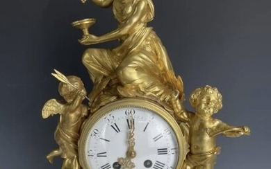 DORE BRONZE AND MARBLE FIGURAL CLOCK