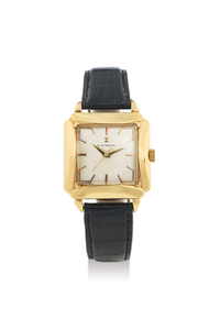 E. Gübelin. A Fine Yellow Gold Square Centre Seconds Wristwatch