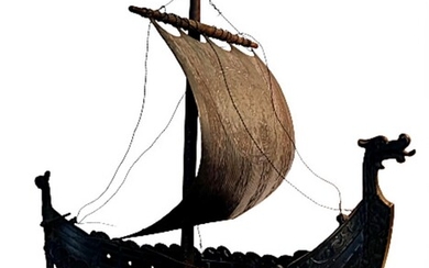 Edward Aagaard A patinated bronze and wood viking ship model. Presumably made by Iron Art, Copenhagen. H. 40. L. 42. D. 19 cm.