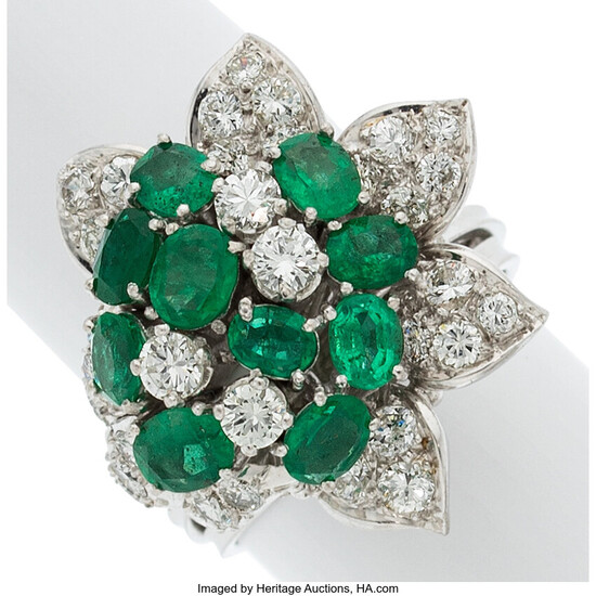 Emerald, Diamond, White Gold Ring Stones: Oval-shaped emeralds weighing...