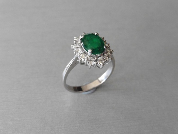 Emerald & diamond cluster ring,2.55ct oval natural emerald...
