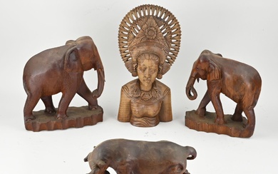 Four various wood-carved images. 20th century. Consisting of; two elephants, bull, Balinese statue. Size: 20...