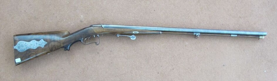 Fusil de chasse système DREYSE, deux coups, calibre 16. Canons en table damas, signés à...