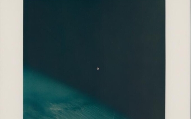 [Gemini VII] First Moonrise: Full Moon rising over the Earth horizon. James...