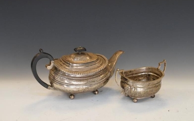 George V silver teapot and two-handled sugar basin, each...