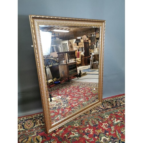 Gilt wall mirror with bevelled plate in the Victorian style....