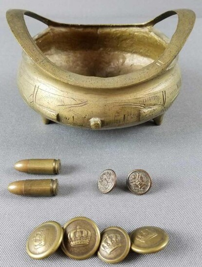Group of brass bowl, bullets, buttons