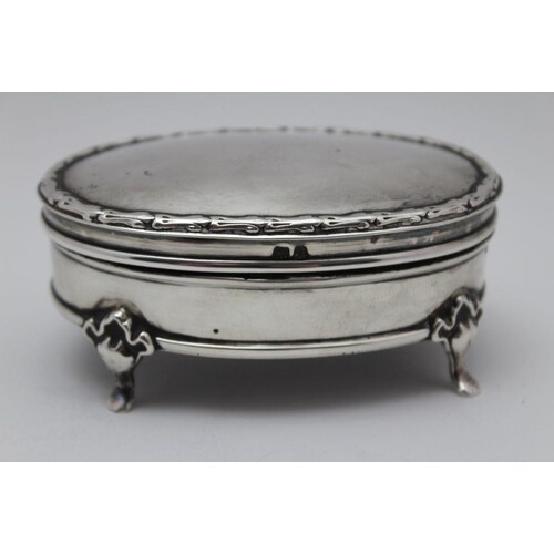 Henry Clifford Davis, An Edwardian oval silver jewellery box...